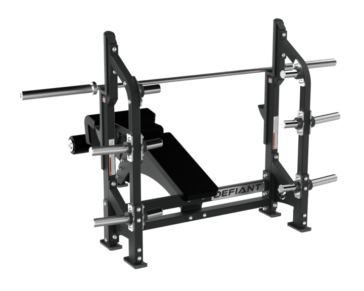 Defiant Strength Olympic decline bench with integrated bar supports and weight plate storage for commercial gyms.