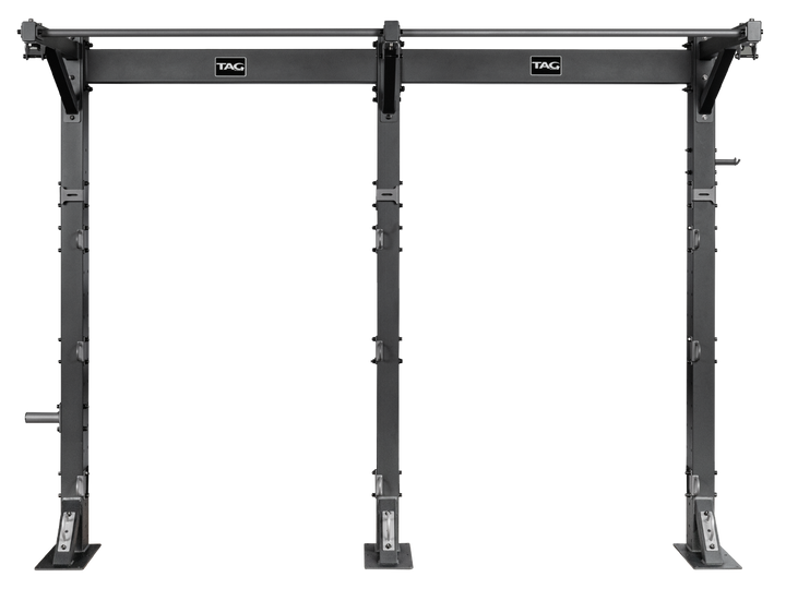 Front view of bolt down fitness bay frame with overhead bar and floor-mounted uprights