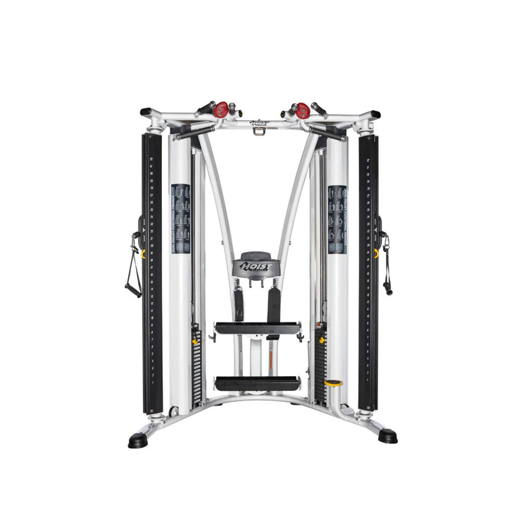 angled view of functional trainer showing dual adjustable pulleys and workout station