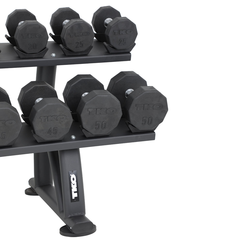Two-tier rack displaying multiple pairs of dumbbells