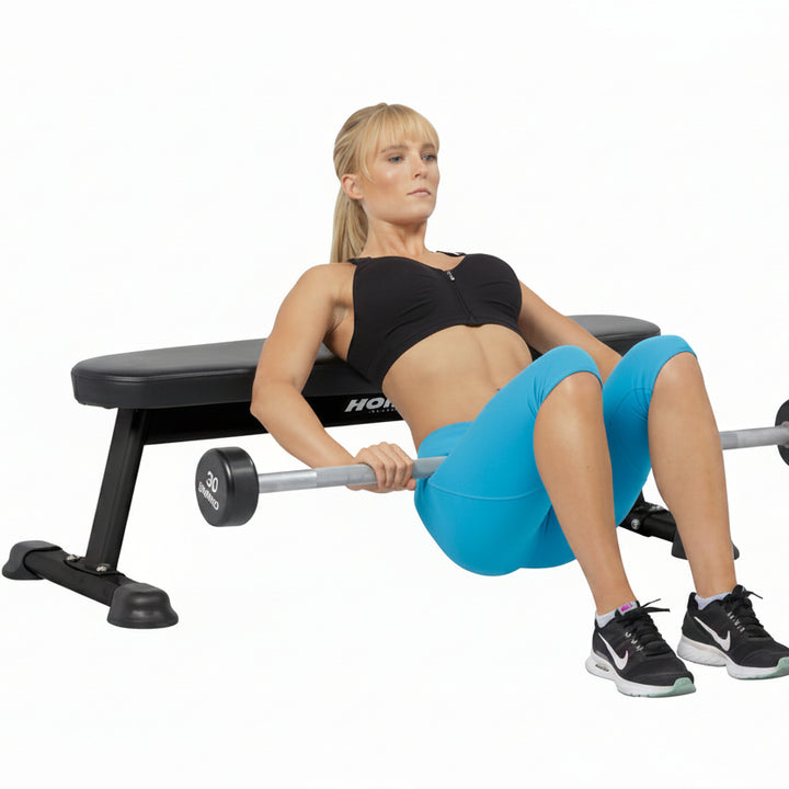 Flat utility bench hip thrust exercise for glute strength and lower body training routines