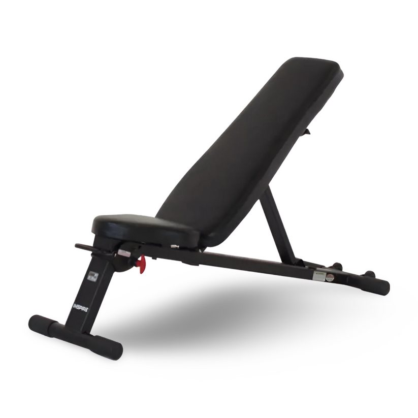 Folding adjustable bench incline position with compact frame for full body strength training in home gym setup