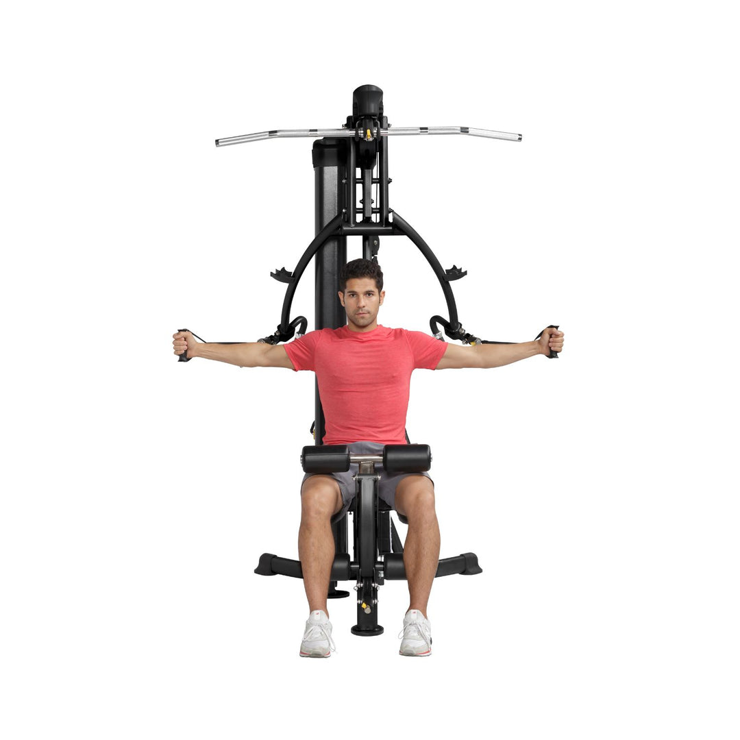 HOIST Mi1 home gym chest fly movement using functional arms for chest and shoulder strength training