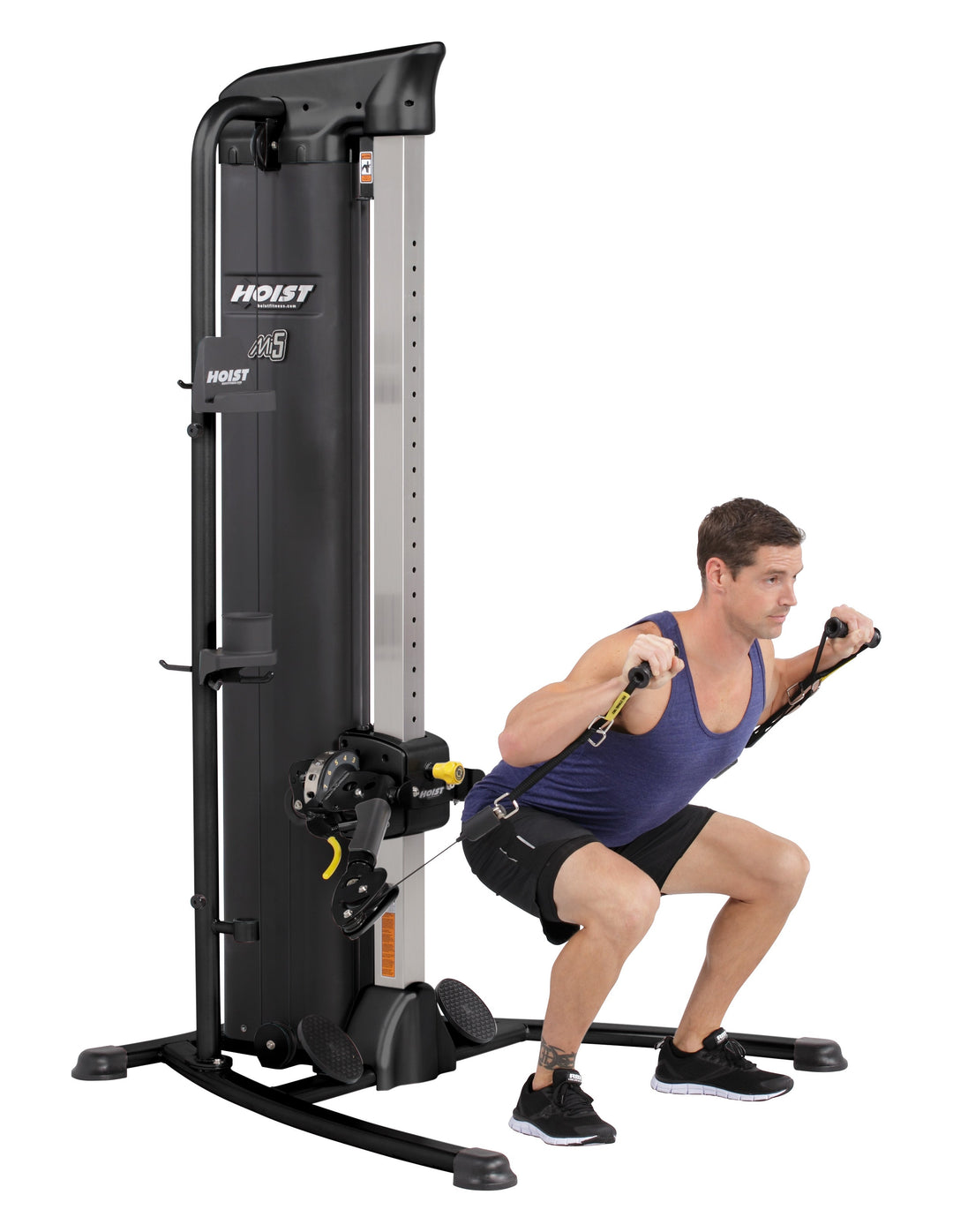 HOIST Mi5 functional trainer squat row combining lower body and back training for full body strength workouts