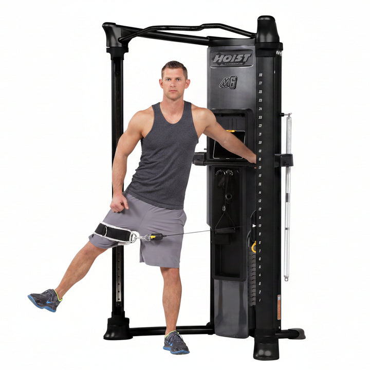 HOIST Mi6 functional trainer standing leg movement using cable resistance for balance and strength training