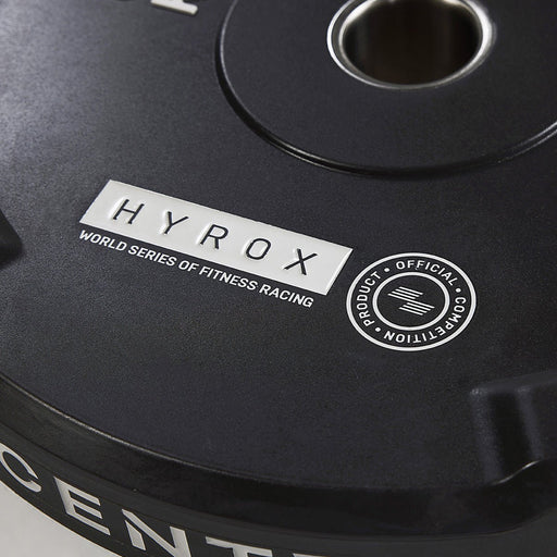 Close-up of the Centr x HYROX Edge Bumper Plate showing the CPU-coated finish.