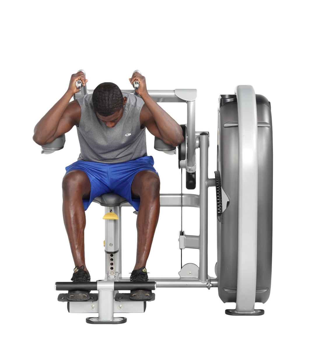User performing abdominal crunch with elbows drawn forward and core engaged on machine
