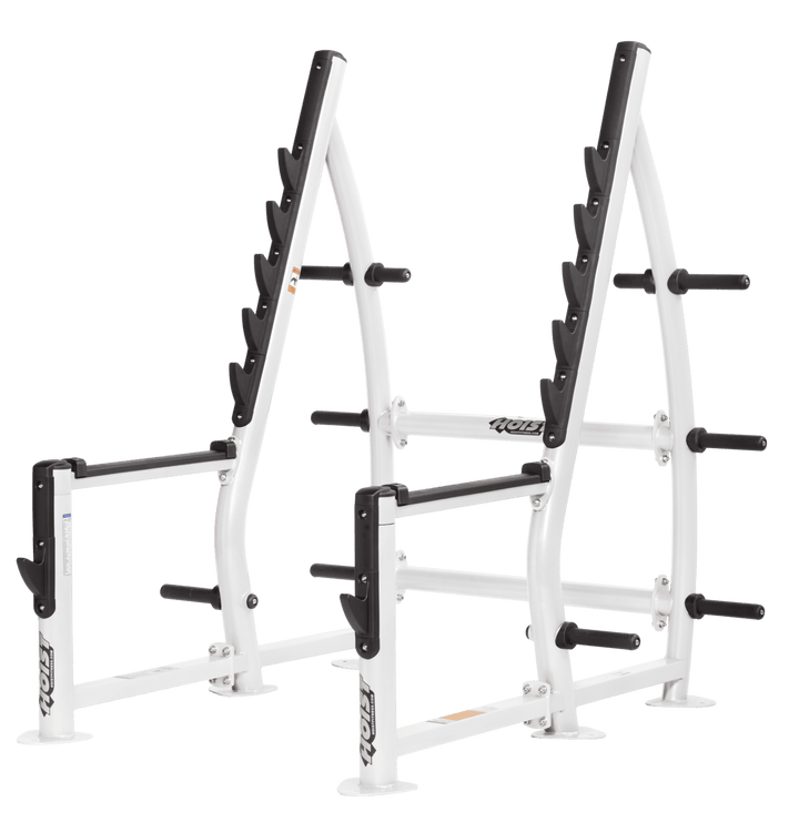 White frame squat rack with open design, barbell supports, and storage pegs