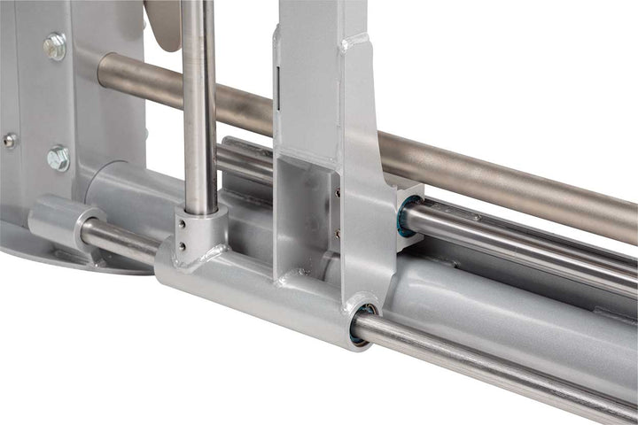 Close-up of dual action Smith machine linear bearing carriage and guide rails