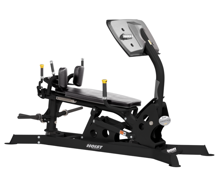 angled side view of dual action leg press machine highlighting seat positioning, footplate, and frame design