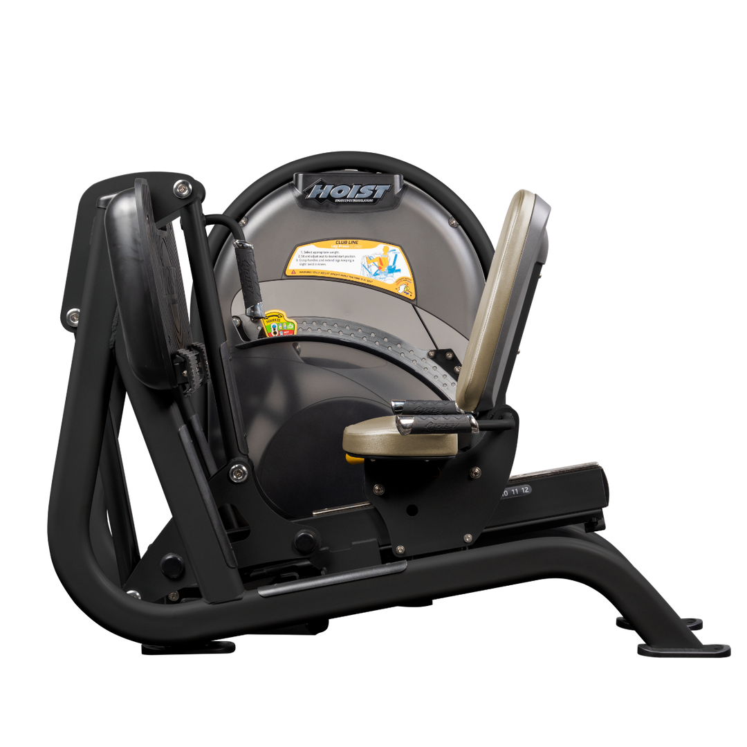 Seated leg press machine with angled foot platform and back support for lower body strength training