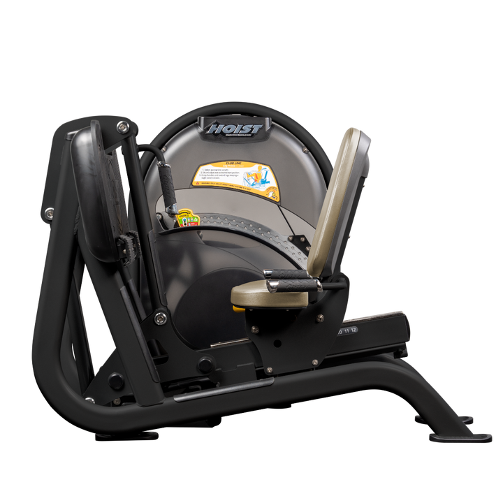 Seated leg press machine with angled foot platform and back support for lower body strength training