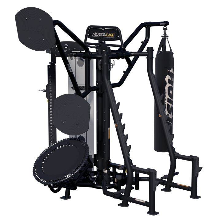 front angled view of Motion Cage Studio Package 5 featuring boxing bag, rebounder attachment, and integrated weight storage