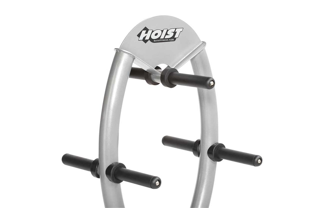 Close-up view of plate storage pegs on circular frame for easy loading and unloading