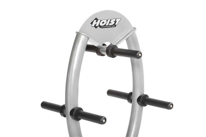 Close-up view of plate storage pegs on circular frame for easy loading and unloading