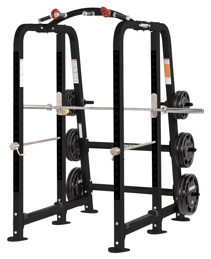 Commercial power cage with integrated barbell racking, safety bars, and weight plate storage pegs for strength training