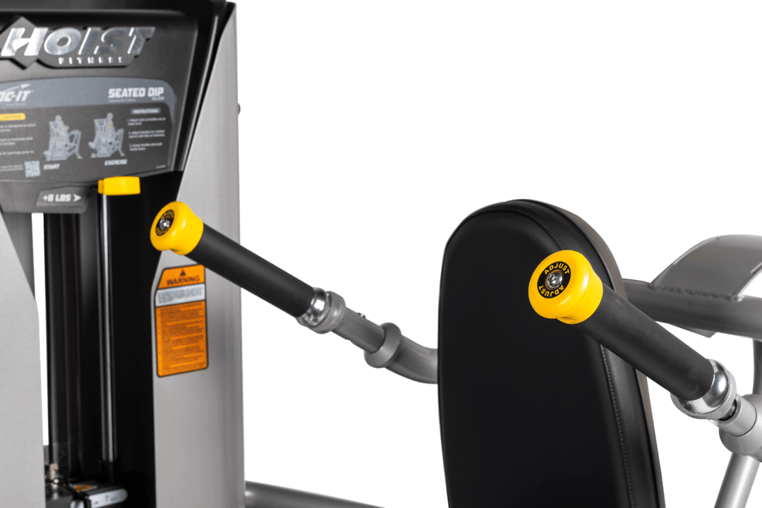 Close-up of adjustable dip handles with grip positioning for customized exercise setup