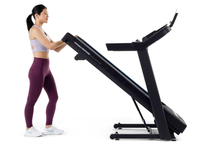 Horizon T101 Connect treadmill shown folded for compact storage.