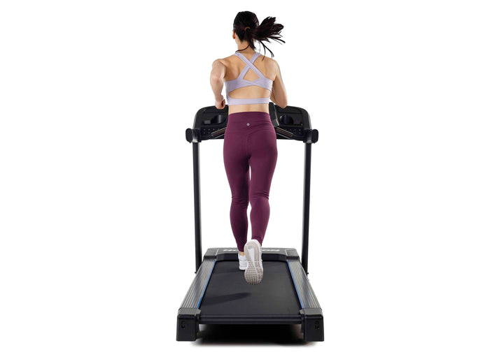 Rear view of the Horizon T101 Connect treadmill during a walking workout.
