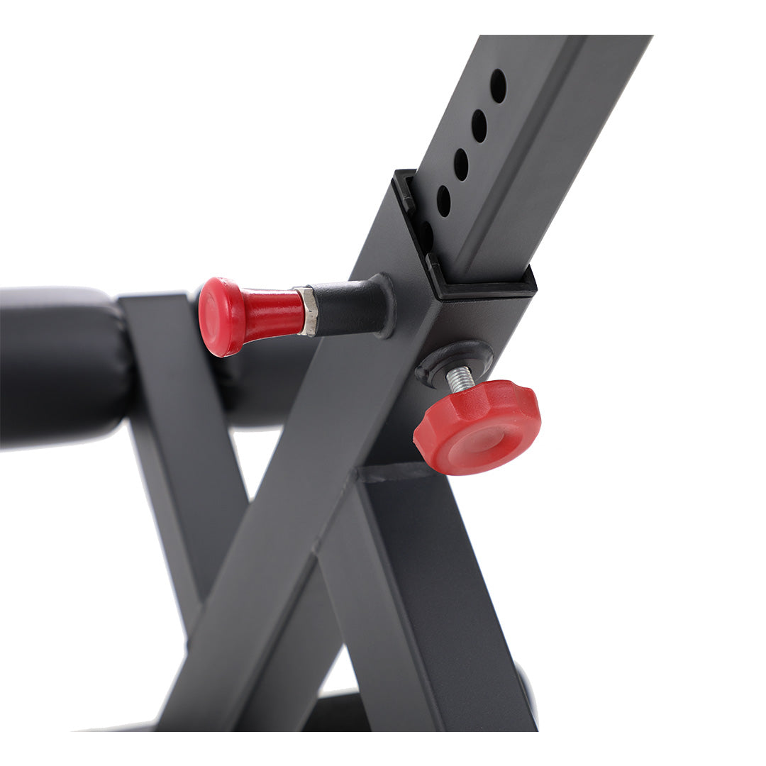 Close-up of adjustment knob and telescoping frame on TKO hyperextension bench.