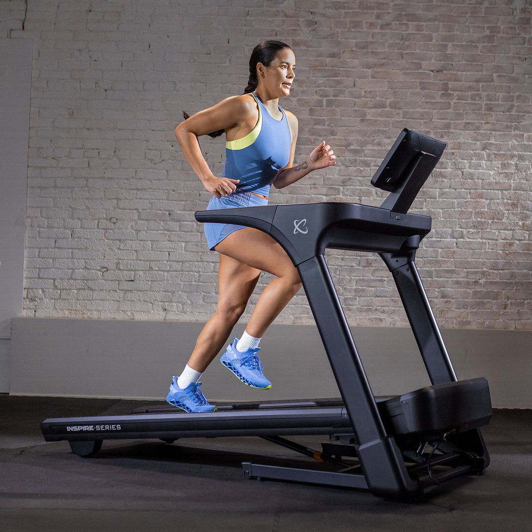 Inspire Series T5 folding treadmill with natural stride technology