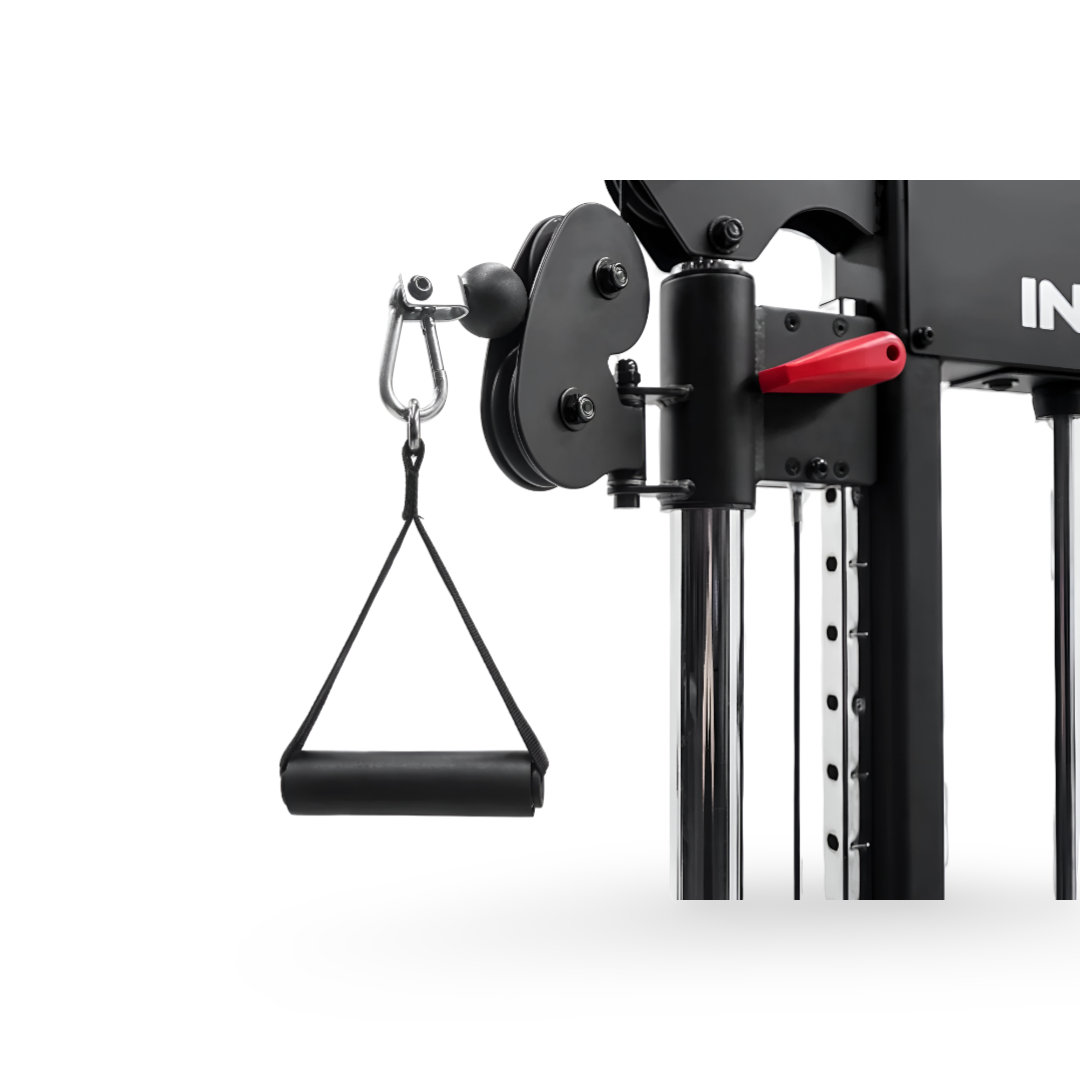 Close-up of Inspire Fitness FTX functional trainer adjustable pulley with Deluxe D handle