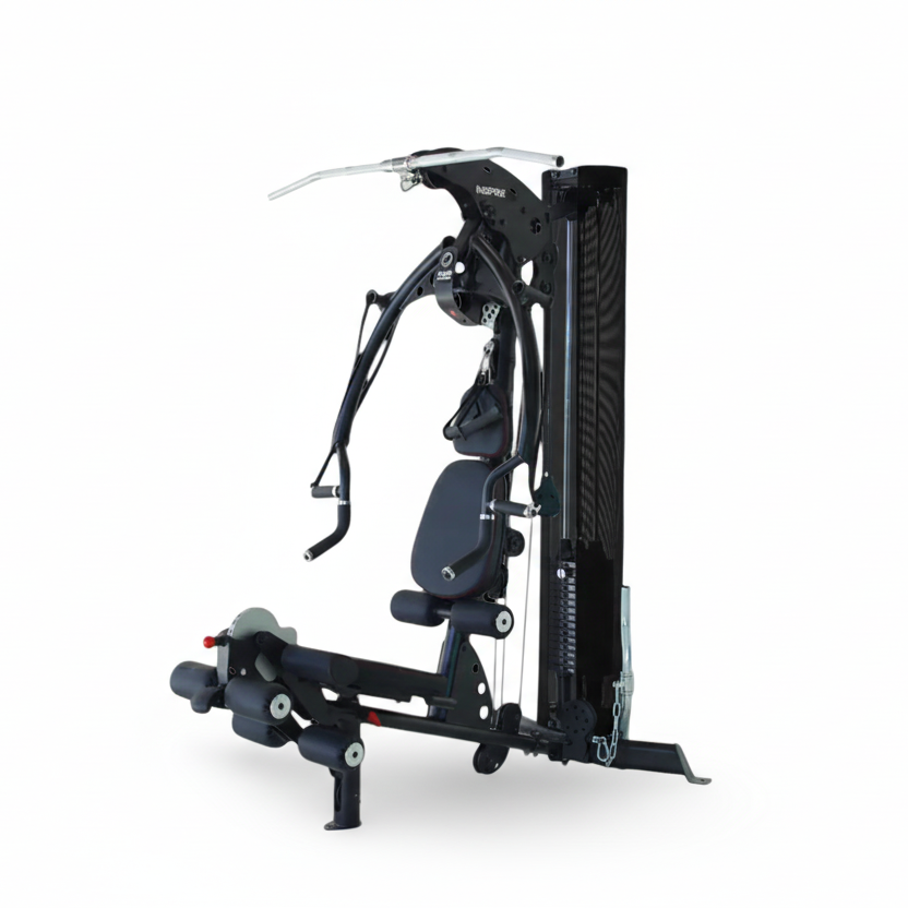 Inspire M2 multi gym with press arms, leg developer, and weight stack for full body strength training in a compact home gym design