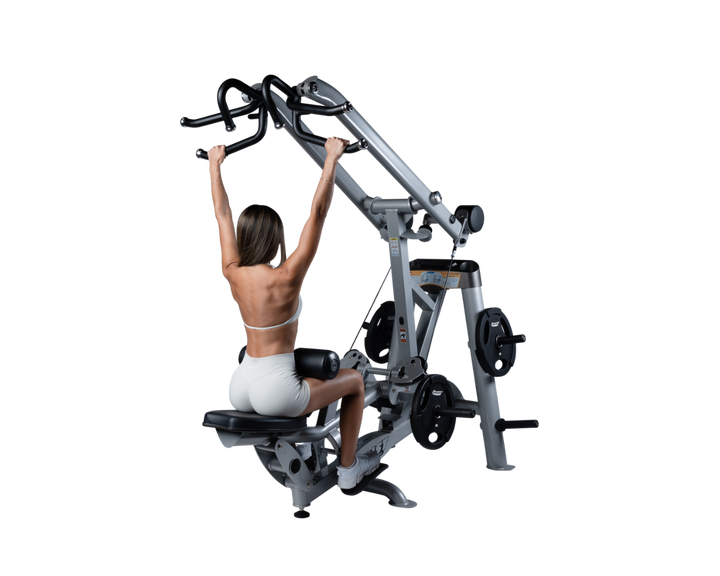 user seated on lat pulldown machine with arms extended overhead gripping handles preparing for back exercise