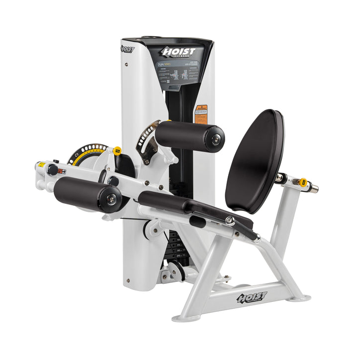 angled view of leg extension and leg curl machine showing adjustable pads and seat