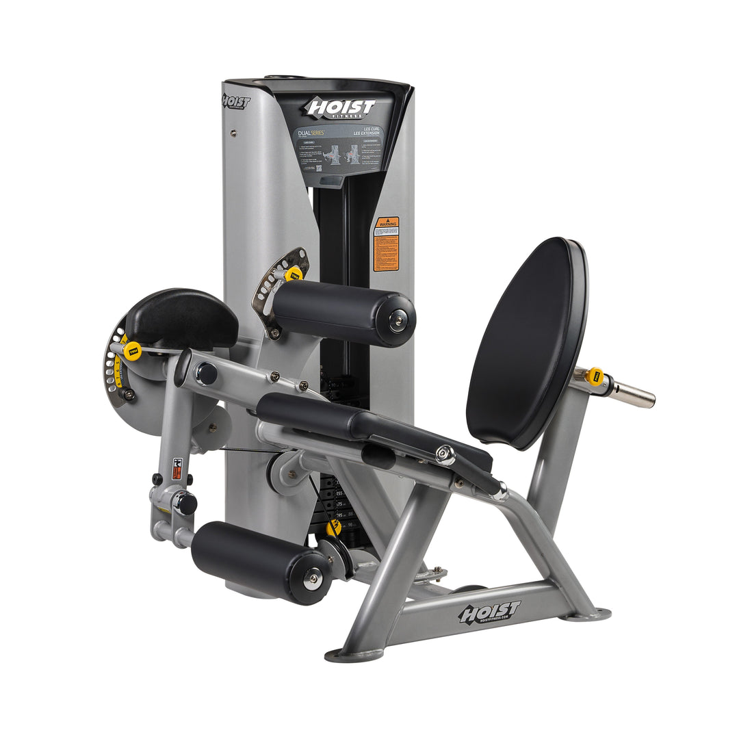 leg extension and leg curl machine in light frame finish for lower body workouts