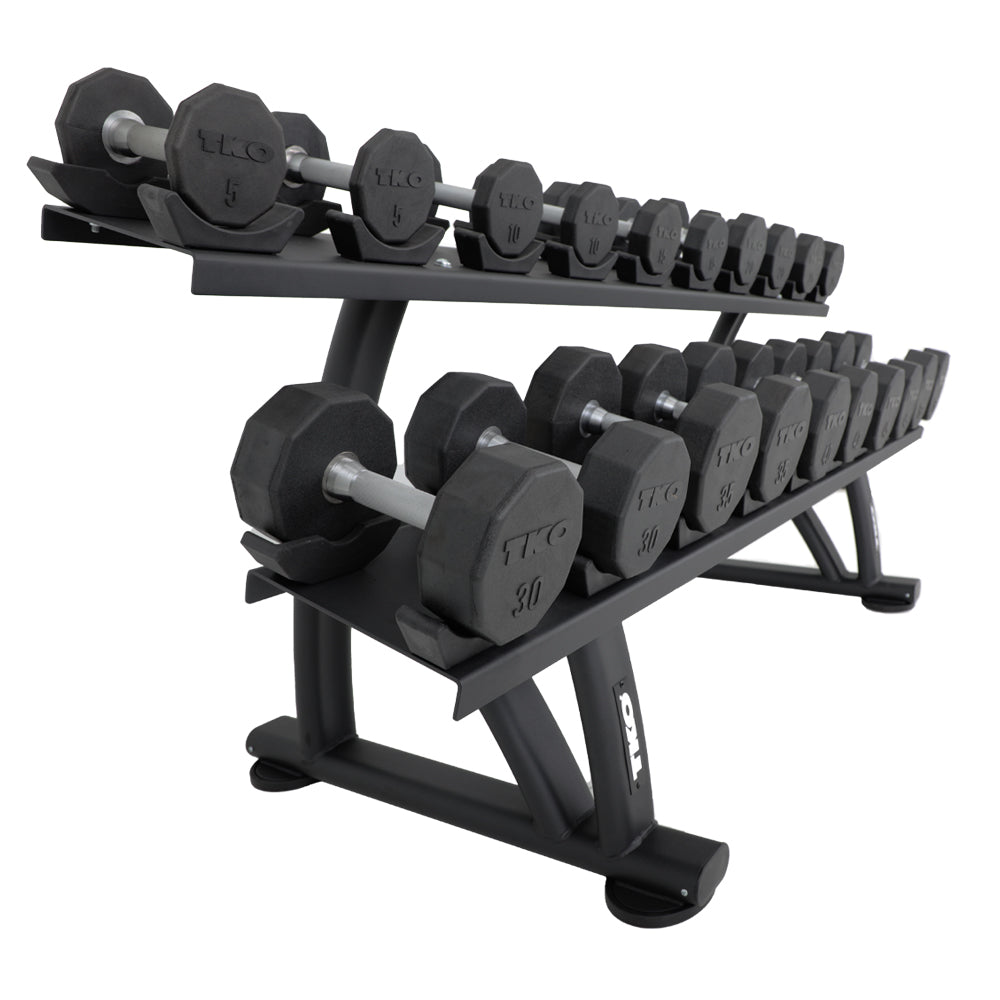 Side angle of commercial dumbbell rack with dumbbells stored