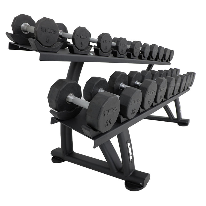 Side angle of commercial dumbbell rack with dumbbells stored