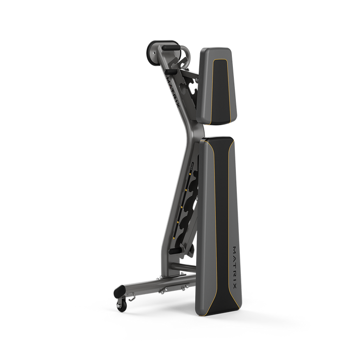 Matrix adjustable weight bench in vertical storage position showing compact design for efficient home gym space use