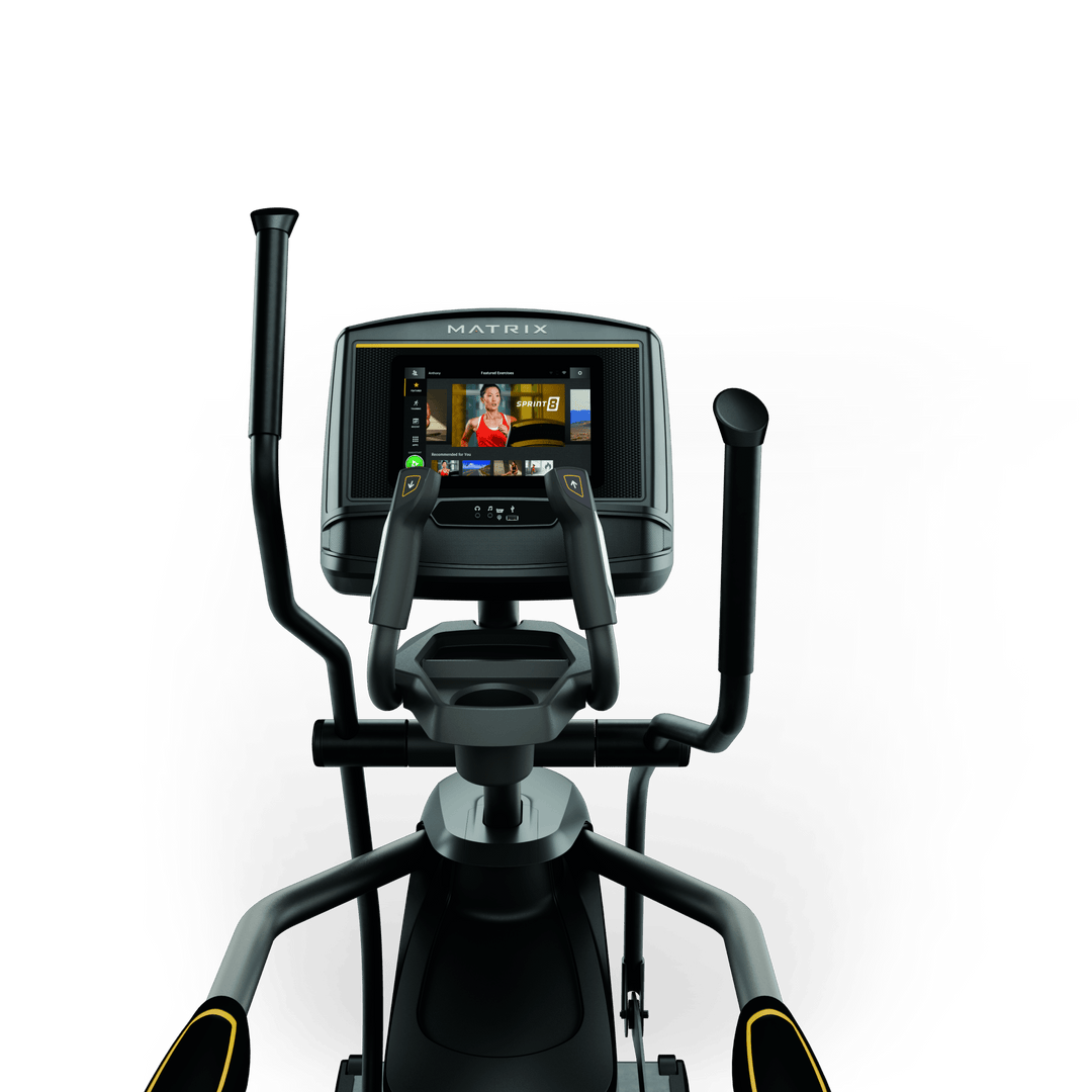 Front view of Matrix E30 elliptical with XER console showing workout metrics and ergonomic handlebar design for home cardio use