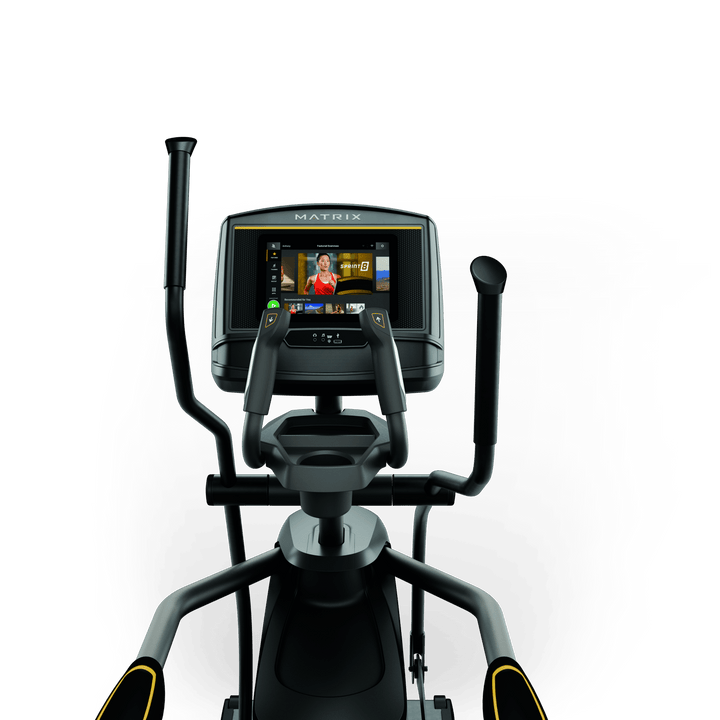 Front view of Matrix E30 elliptical with XER console showing workout metrics and ergonomic handlebar design for home cardio use