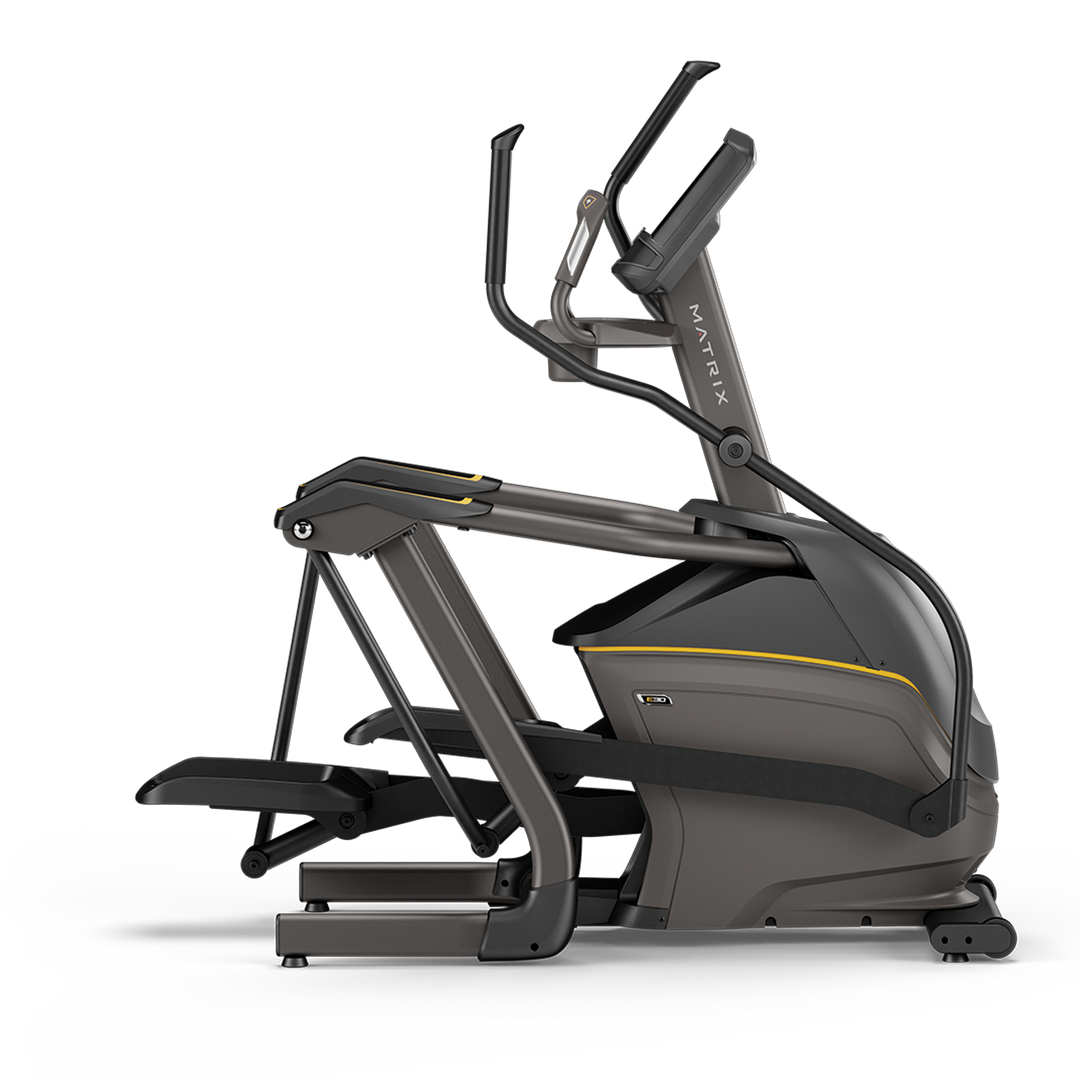 Side profile of Matrix E30 elliptical with XIR touchscreen console showing compact frame and smooth stride for home cardio workouts