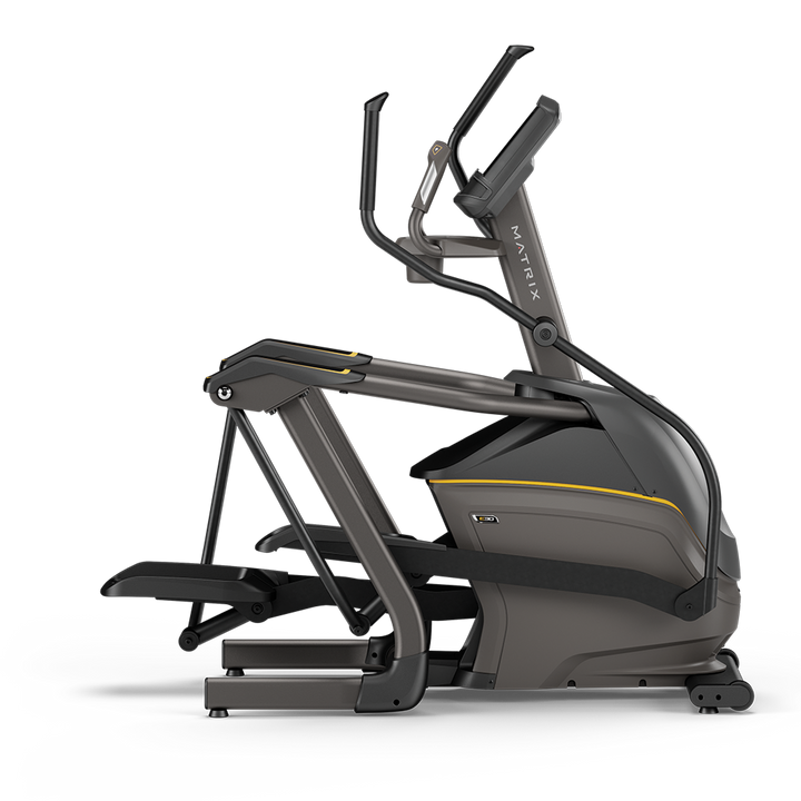 Side profile of Matrix E30 elliptical with XIR touchscreen console showing compact frame and smooth stride for home cardio workouts