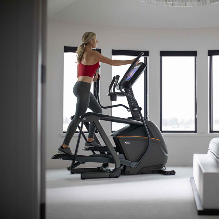 Matrix E50 elliptical overview showing smooth stride motion, durable frame, and ergonomic design for home cardio workouts