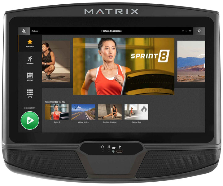 Matrix E50 elliptical XER console with touchscreen interface showing workout metrics and interactive training features