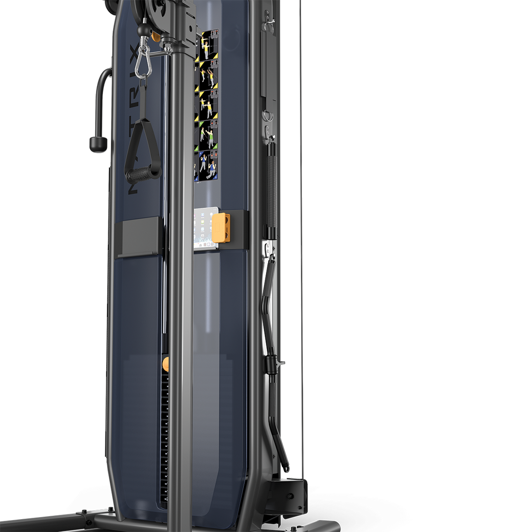 Matrix functional trainer front angle close up showing dual adjustable pulleys and cable system for strength training