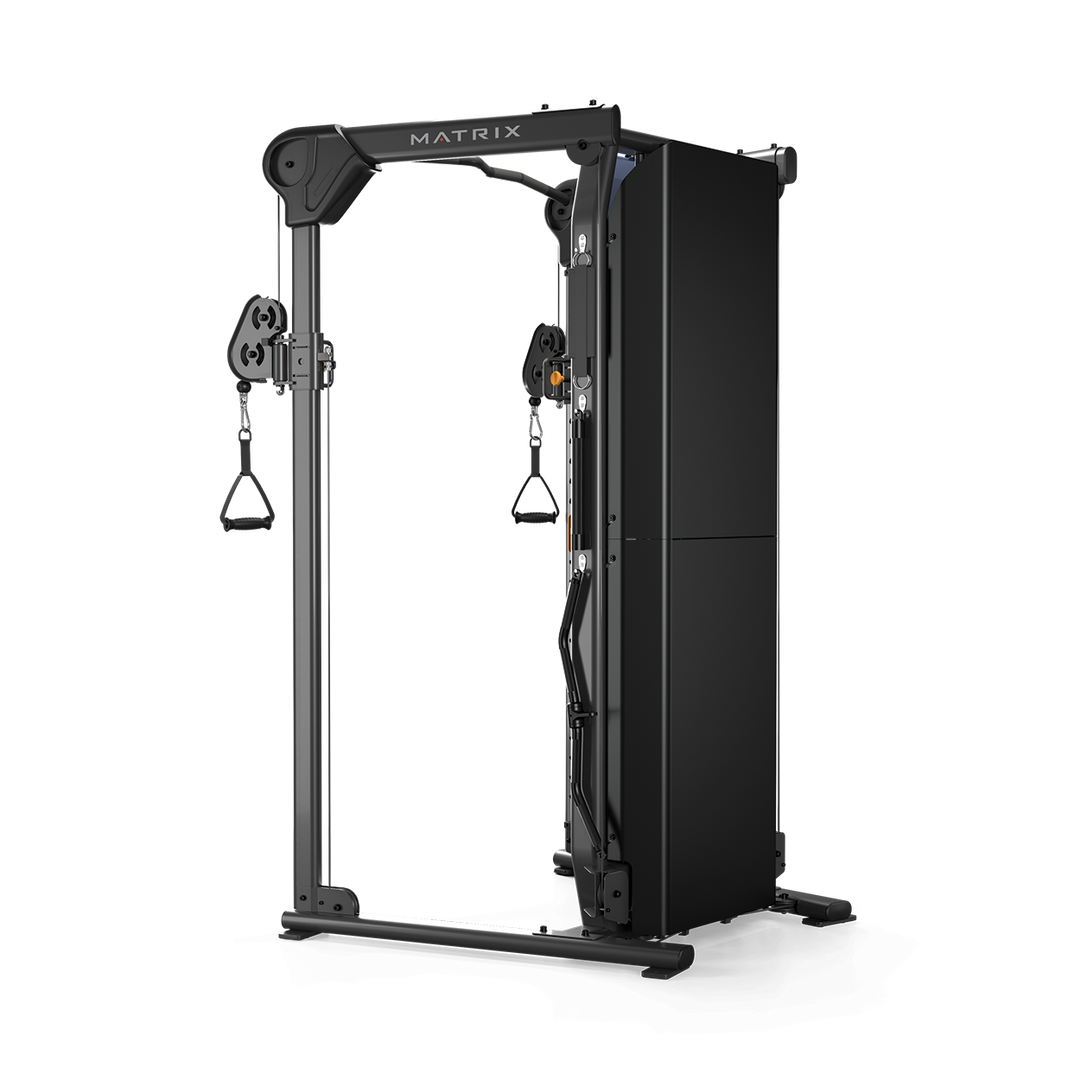 Rear three quarter view of Matrix functional trainer showing dual weight stacks and cable system for strength training