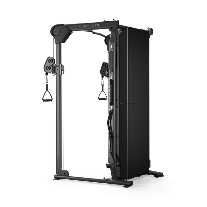 Rear three quarter view of Matrix functional trainer showing dual weight stacks and cable system for strength training