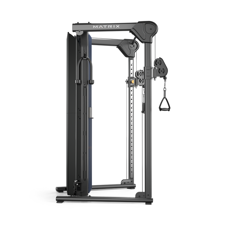 Side profile of Matrix functional trainer showing dual adjustable pulleys and weight stacks for full body strength training workouts
