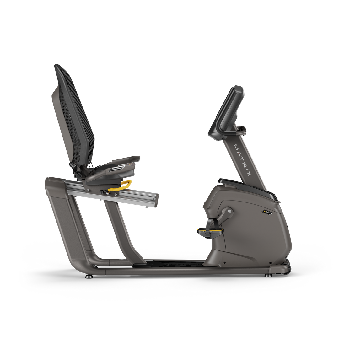 Side profile of Matrix R50 recumbent bike with XR LED console showing ergonomic seat and low impact cardio design