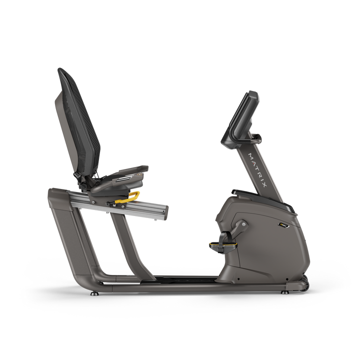 Side profile of Matrix R50 recumbent bike with XR LED console showing ergonomic seat and low impact cardio design