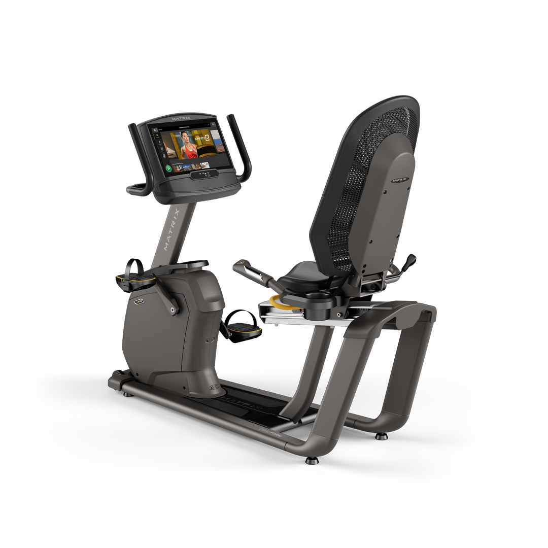 Matrix R50 recumbent bike with XIR touchscreen console, ergonomic seat, and smooth low impact pedaling for home cardio workouts