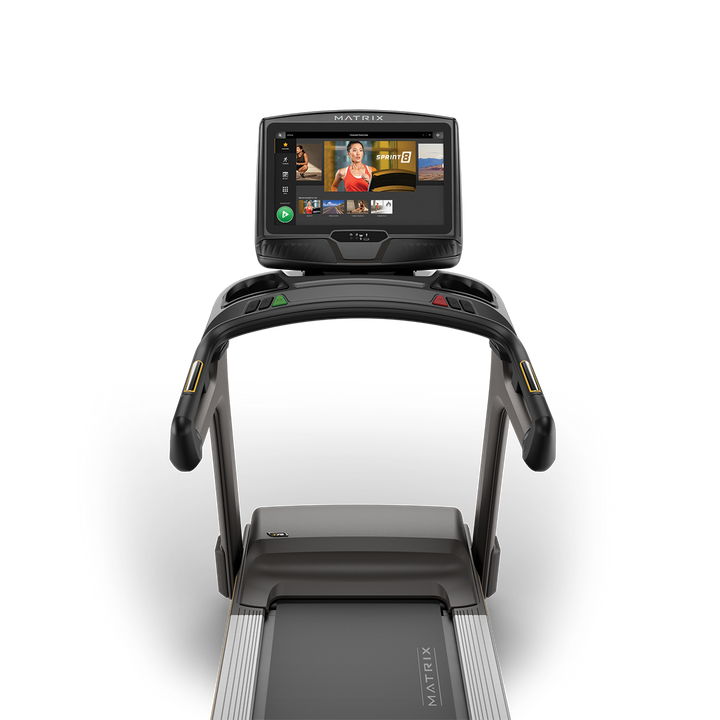 Front view of Matrix T75 treadmill with XUR touchscreen console showing workout metrics and durable commercial design