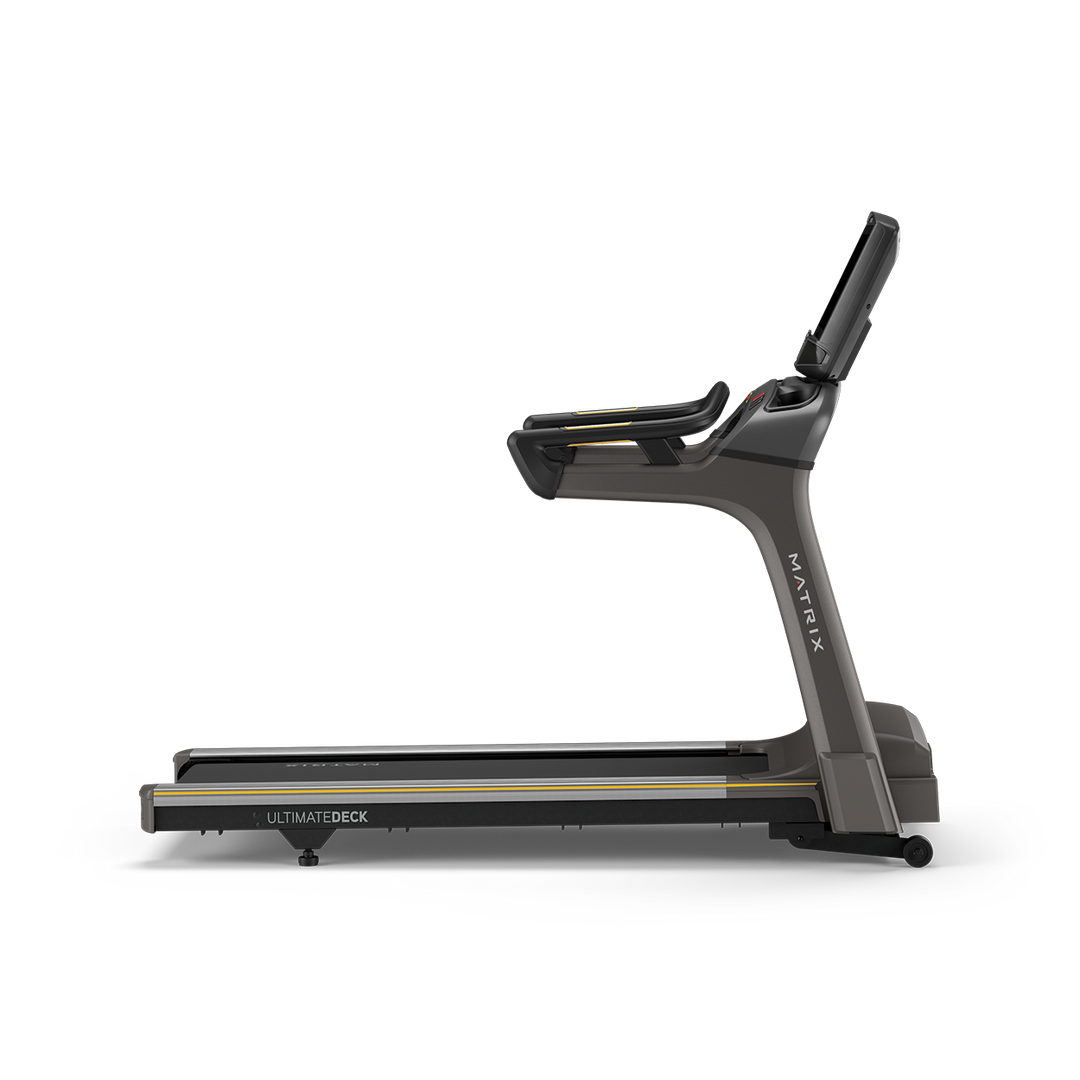 Side profile of Matrix T75 treadmill with XUR touchscreen console and heavy-duty frame for commercial cardio training
