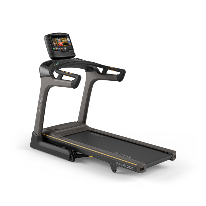 Matrix TF30 folding treadmill hero image featuring XIR touchscreen console, Ultimate Deck cushioning, and modern home fitness design