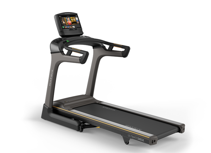 Matrix TF50 folding treadmill with XIR touchscreen console, Ultimate Deck cushioning, and space-saving design for home workouts